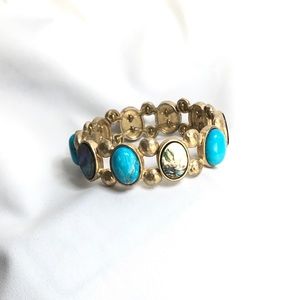 Abalone and teal beads imbedded in gold metal